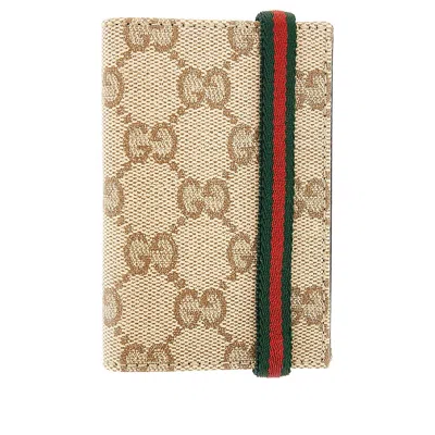 Gucci Coated Gg Canvas Bi-fold Cardholder In Beige