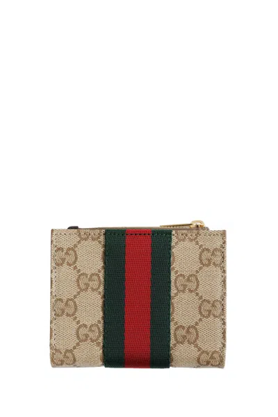 Gucci Coated Gg Canvas In Brown