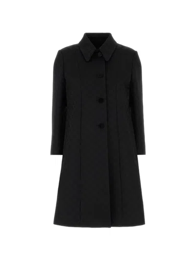 Gucci Coats In Black