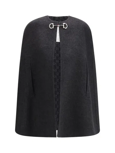 Gucci Coats In Black