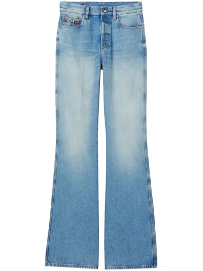 GUCCI COTTON DENIM FLARE PANTS WITH BLEACHED EFFECT