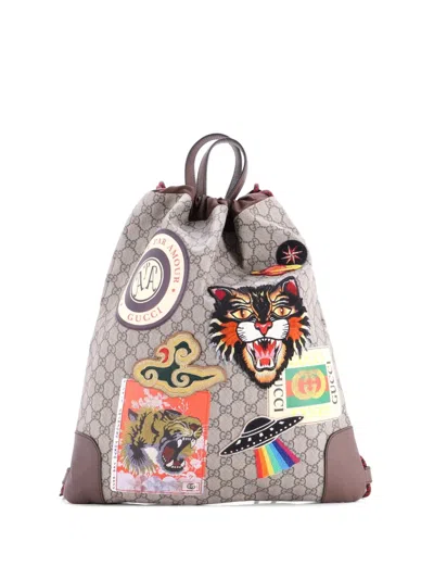 Pre-owned Gucci Courrier Soft Drawstring Gg Coated Canvas With Applique Medium Backpack In Brown