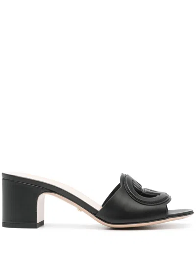 Gucci Interlocking G Leather Mules In Black