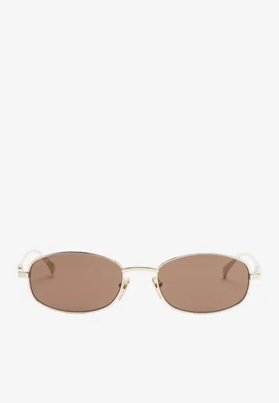 Gucci Cut-out Logo Oval Sunglasses In Brown