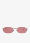 Gucci Cut-out Logo Oval Sunglasses In Neutral