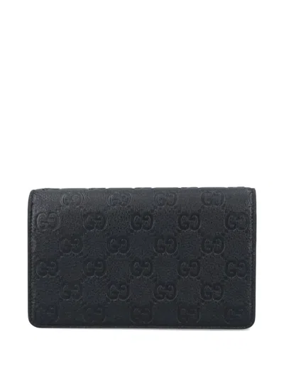 Gucci Debossed-monogram Wallet In Black