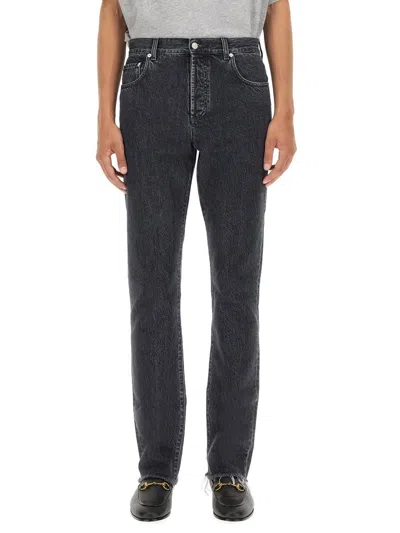 Gucci Raw Cut Hem Mid Rise Jeans In Black