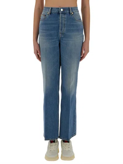 Gucci Denim Pants With Logo Label In Blue