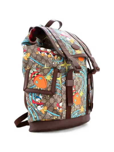 Pre-owned Gucci Disney Donald Duck Double Pocket Buckle Printed Gg Coated Canvas Medium Backpack In Brown