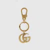 Gucci Double G Keychain In Silver