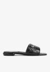 Gucci Meg Flat Sandals With Engraved Signature Gg Logo In Black