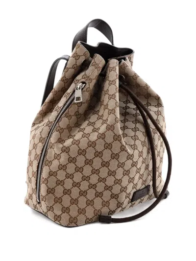 Pre-owned Gucci Drawstring Gg Canvas Medium Backpack In Brown