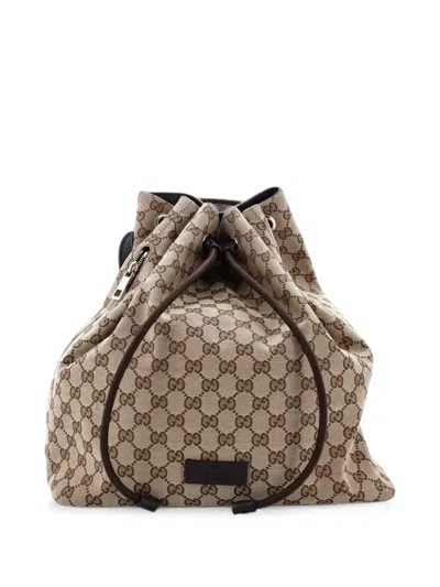 Pre-owned Gucci Drawstring Gg Canvas Medium Backpack In Brown