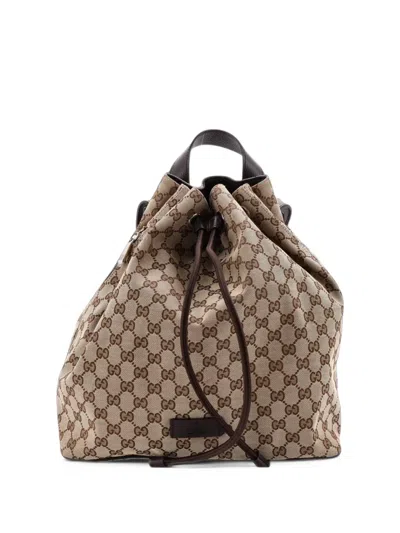 Pre-owned Gucci Drawstring Gg Canvas Medium Backpack In Brown