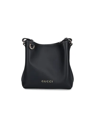 GUCCI EMBLEM BUCKET BAG