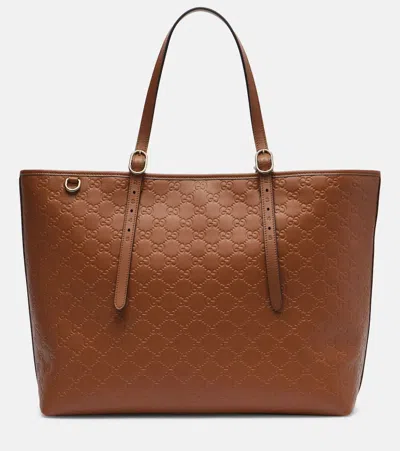 Gucci Emblem Gg Leather Tote Bag In Sand