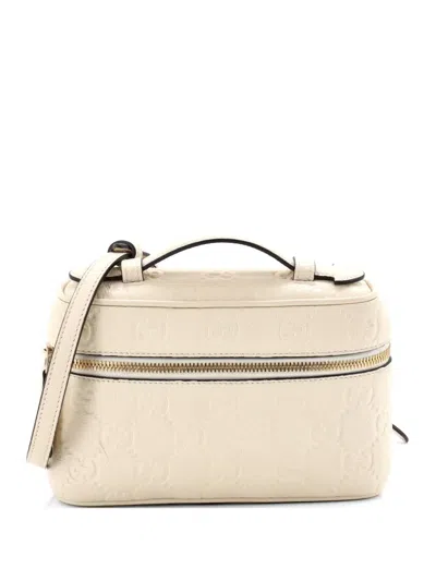 Pre-owned Gucci Emblem Top Handle Vanity Bag Gg Embossed Leather Small Shoulder Bag In Neutral