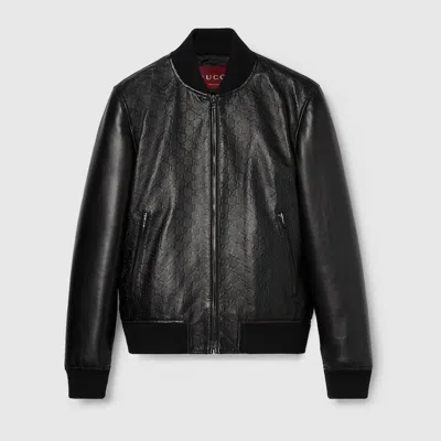 Gucci Embossed Gg Leather Bomber Jacket In Black
