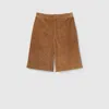 Gucci Embossed Gg Suede Shorts In Brown