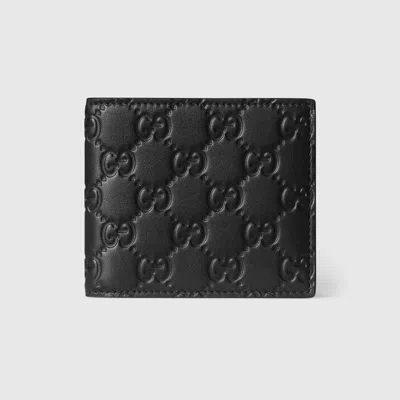 Gucci Embossed Leather Bifold Wallet In Black