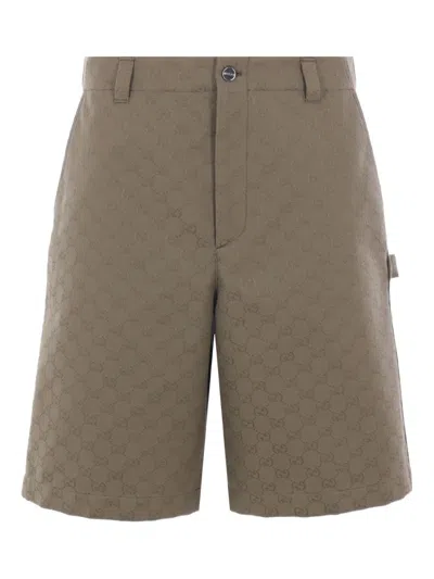 Gucci Embossed-logo Shorts In Brown