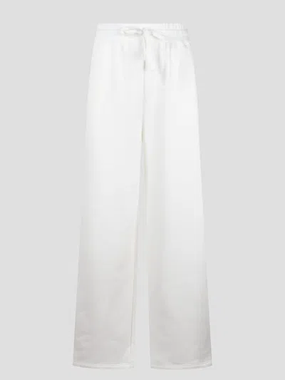 Gucci Embroidered Cotton Jersey Trousers In Black