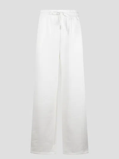 GUCCI EMBROIDERED COTTON JERSEY TROUSERS