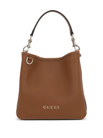 Gucci Embroidered-logo Bucket Bag In Brown