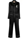 Gucci Embroidered Logo Jumpsuit In Schwarz