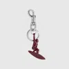 Gucci Engraved Surfer Keychain Charm In Bordeaux