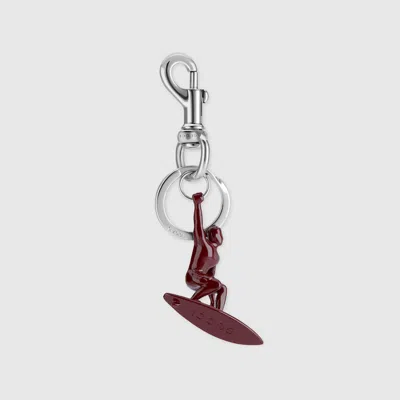 Gucci Engraved Surfer Keychain Charm In Bordeaux