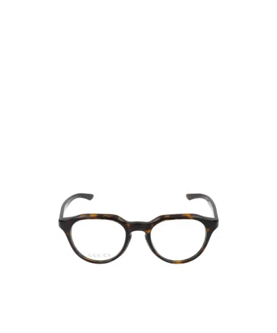 Gucci Eyewear Oval Frame Glasses In Brown