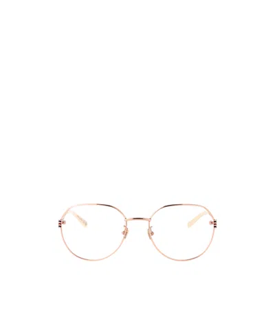 Gucci Eyewear Oval Frame Glasses In White
