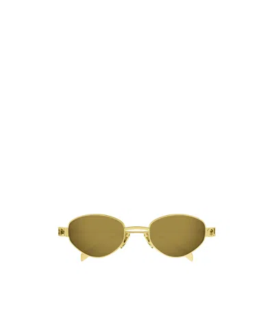 Gucci Eyewear Oval Frame Sunglasses In Gold
