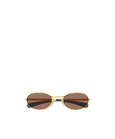 Gucci Eyewear Oval Frame Sunglasses In Gold