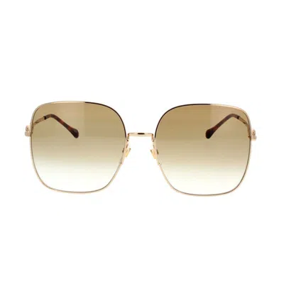 Gucci Eyewear Sunglasses In Gold