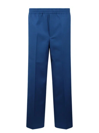 Gucci Fluid Drill Trousers In Blue