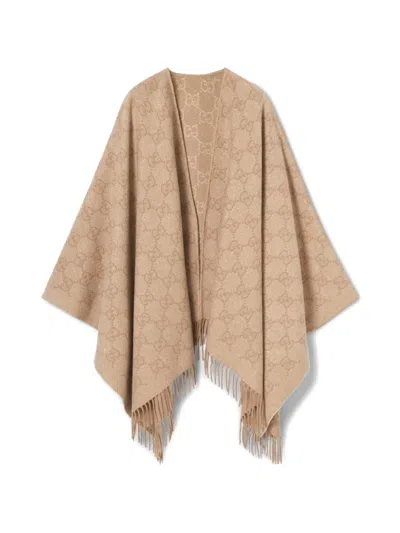 Gucci Gg-patterned Fringed Cape In Neutral