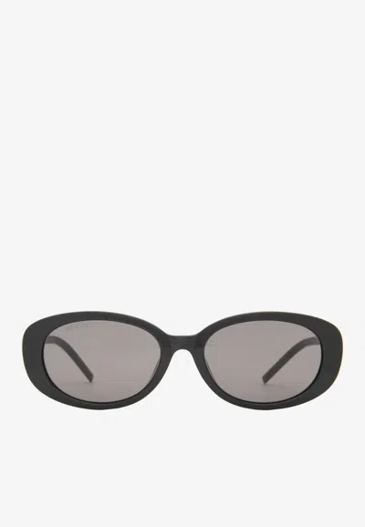 Gucci G Logo Oval Sunglasses In Gray