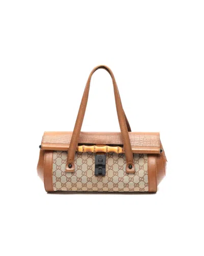 Gucci Gg Bamboo Bullet Handbag In Brown