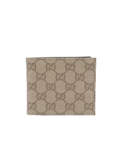 Gucci Gg Bi-fold Wallet In Beige