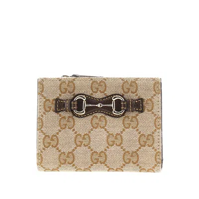 Gucci Gg Canvas Bi-fold Wallet With Horsebit In Brown