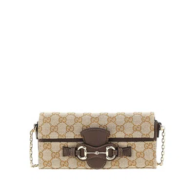 Gucci Gg Canvas Clutch With Horsebit Detail In Brown