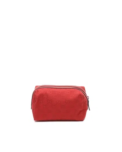 Gucci Gg Canvas Leather Pouch In Purple