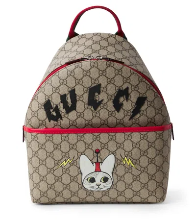 Gucci Gg Canvas Printed Backpack In Brown