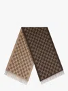 Gucci Monogrammed Fringed Scarf In Brown