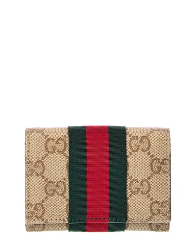 Gucci Gg Coated Canvas Bifold Wallet In Neutral