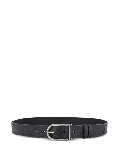 Gucci Gg-debossed Buckle Leather Belt In Black