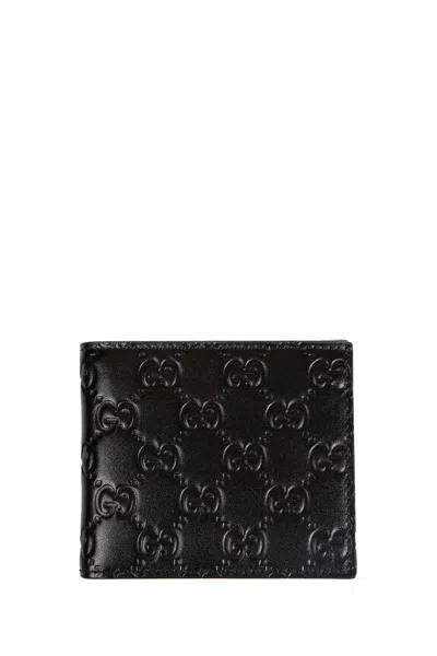 Gucci Gg Emblem Bi-fold Wallet In Black