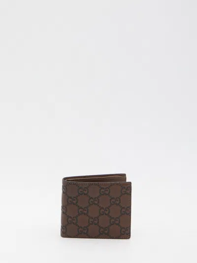 Gucci Gg Emblem Bi-fold Wallet In Brown